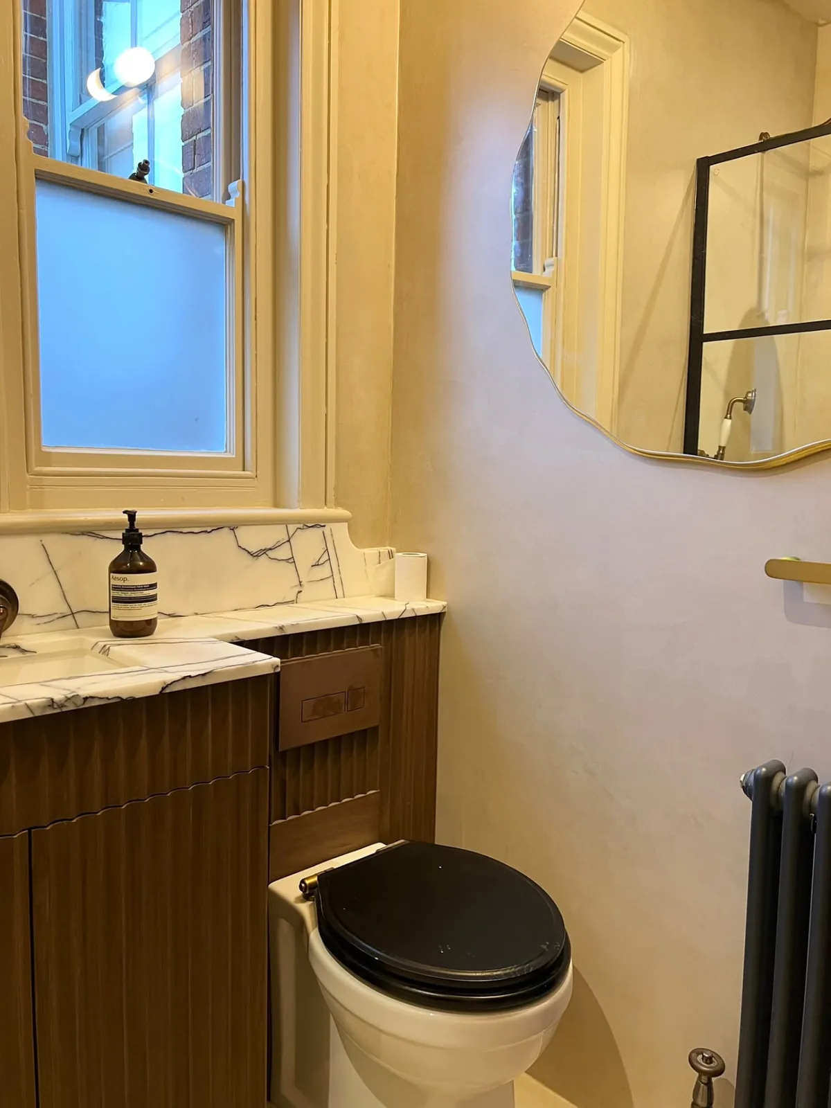 Seamless microcement bathroom walls finished in Microtopping by a Yorkshire microcement specialist