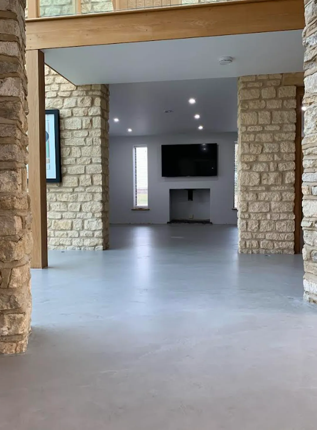 Seamless microcement floor in a stone barn conversion living space